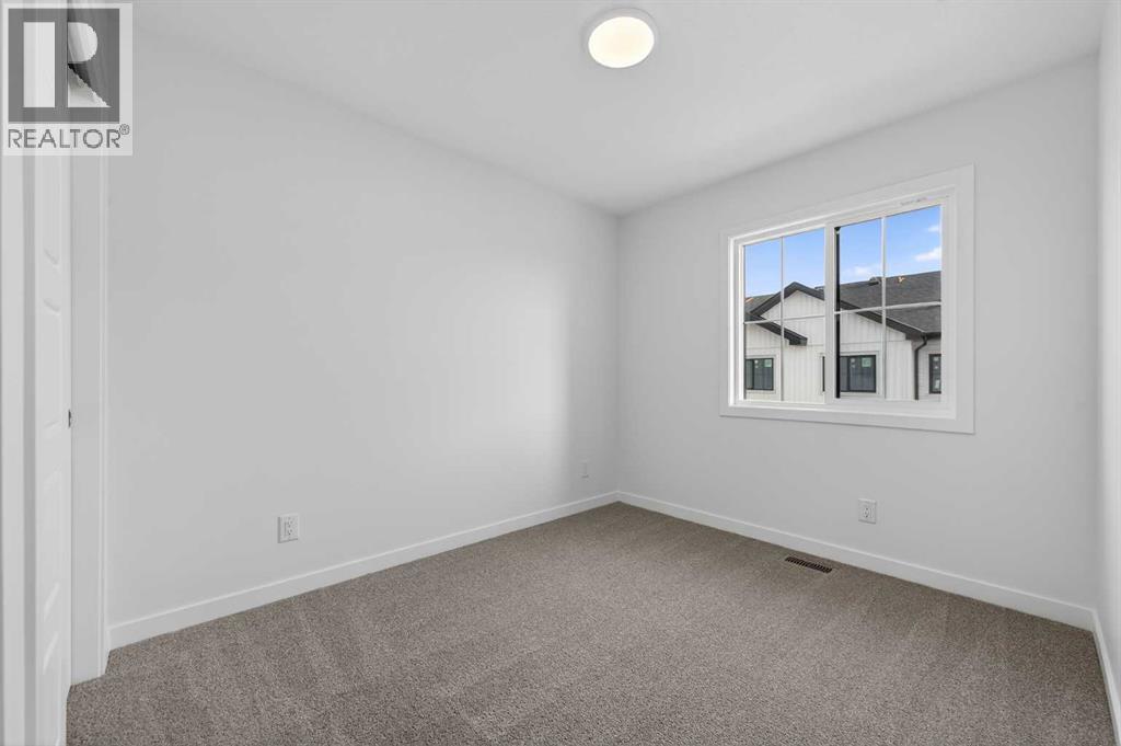 64 Creekside Drive Sw, Calgary, Alberta  T2X 6E2 - Photo 21 - A2282898