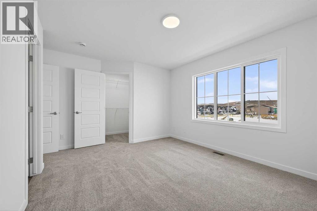 64 Creekside Drive Sw, Calgary, Alberta  T2X 6E2 - Photo 5 - A2282898