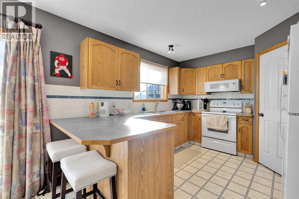 57 West Terrace Road, Cochrane, Alberta  T4C 1S6 - Photo 13 - A2283297