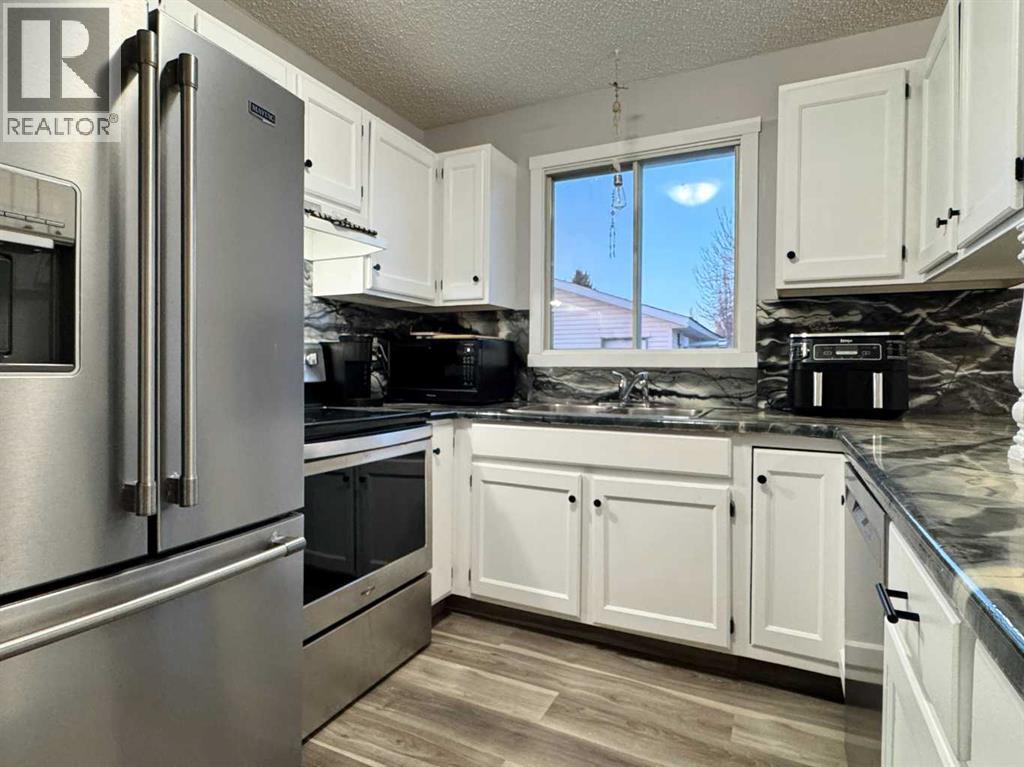 495 Columbia Boulevard W, Lethbridge, Alberta  T1K 4T7 - Photo 9 - A2275594