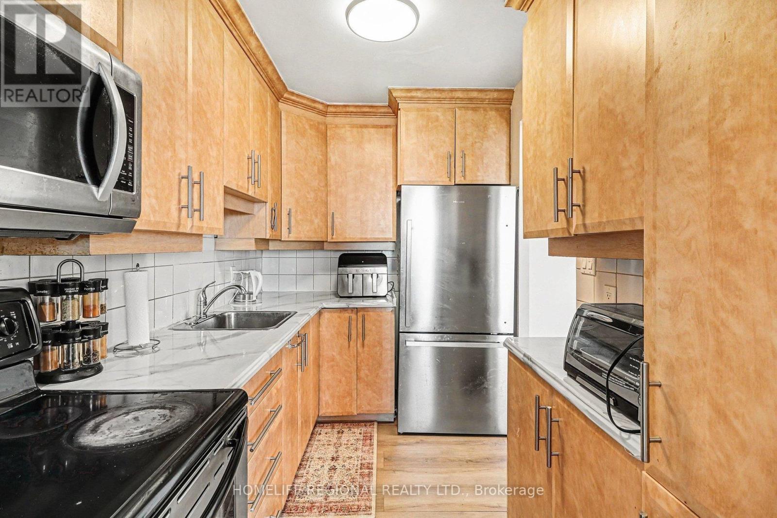 1403 - 2000 Jasmine Crescent, Ottawa, Ontario  K1J 8K4 - Photo 6 - X12767246