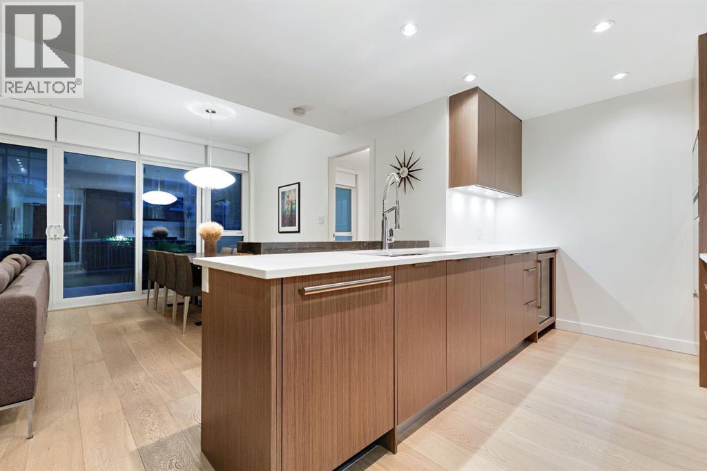 104, 128 Waterfront Court Sw, Calgary, Alberta  T2P 1K9 - Photo 6 - A2264821