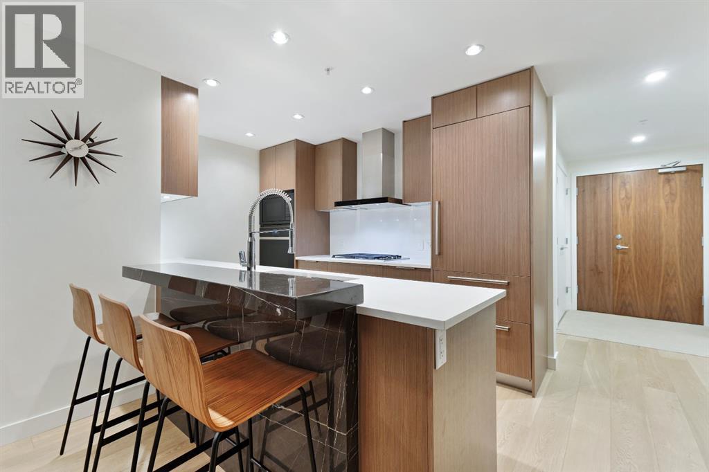 104, 128 Waterfront Court Sw, Calgary, Alberta  T2P 1K9 - Photo 3 - A2264821