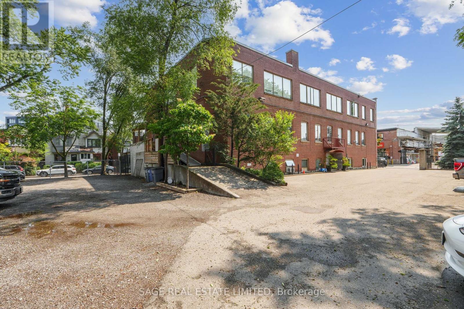 102 - 10 Morrow Avenue, Toronto, Ontario  M6R 2J1 - Photo 3 - W12767474