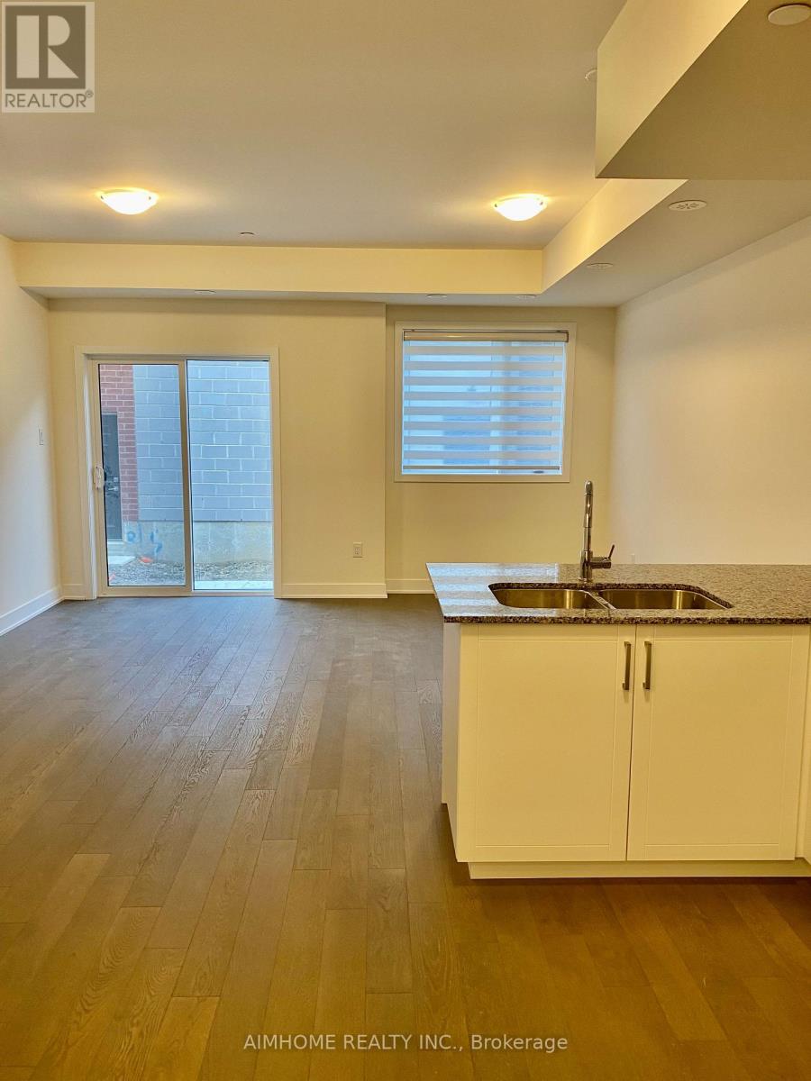 33 Frederick Tisdale Drive, Toronto, Ontario  M3K 0C4 - Photo 8 - W12767552