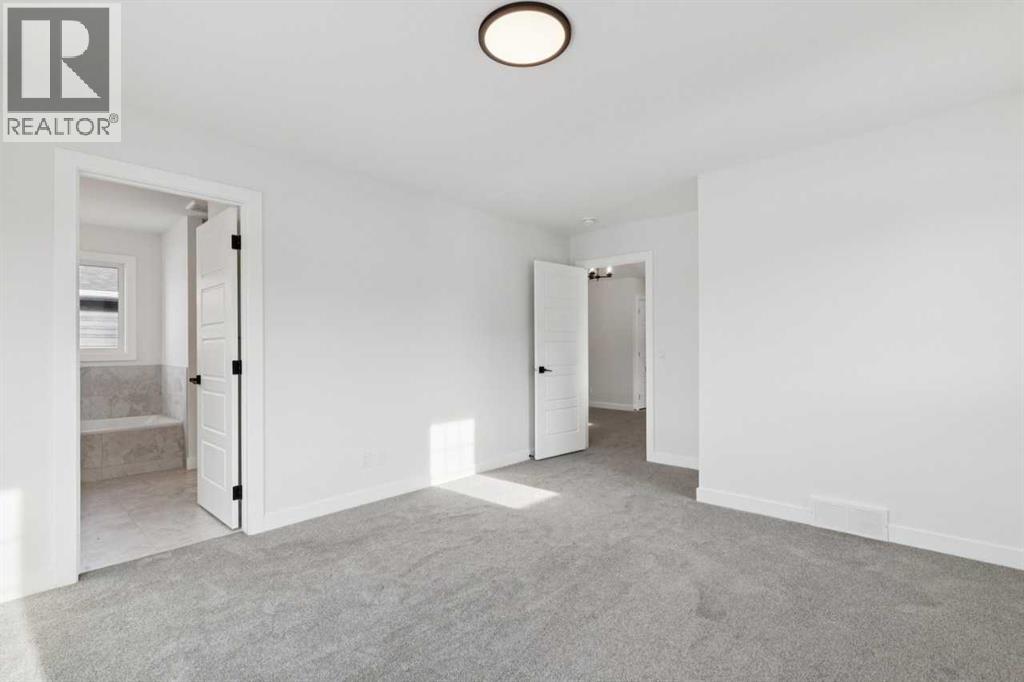 136 Versant Point Sw, Calgary, Alberta  T2Y 0Z5 - Photo 21 - A2272129