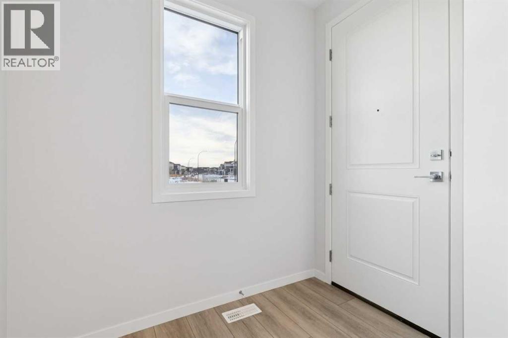 264 Belmont Place Sw, Calgary, Alberta  T2X 0T9 - Photo 3 - A2284306