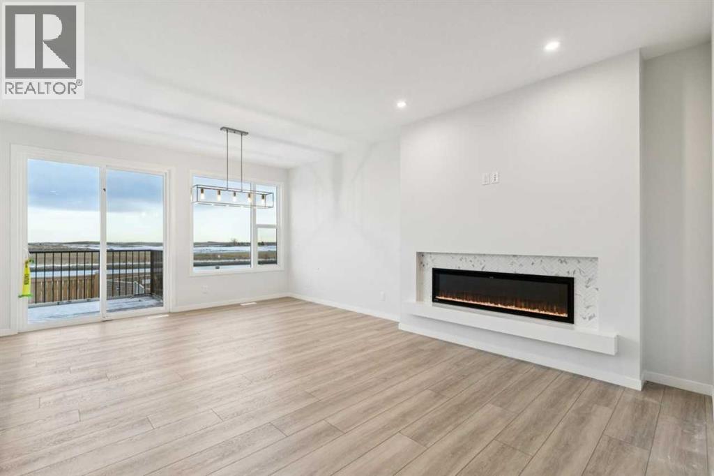 264 Belmont Place Sw, Calgary, Alberta  T2X 0T9 - Photo 4 - A2284306