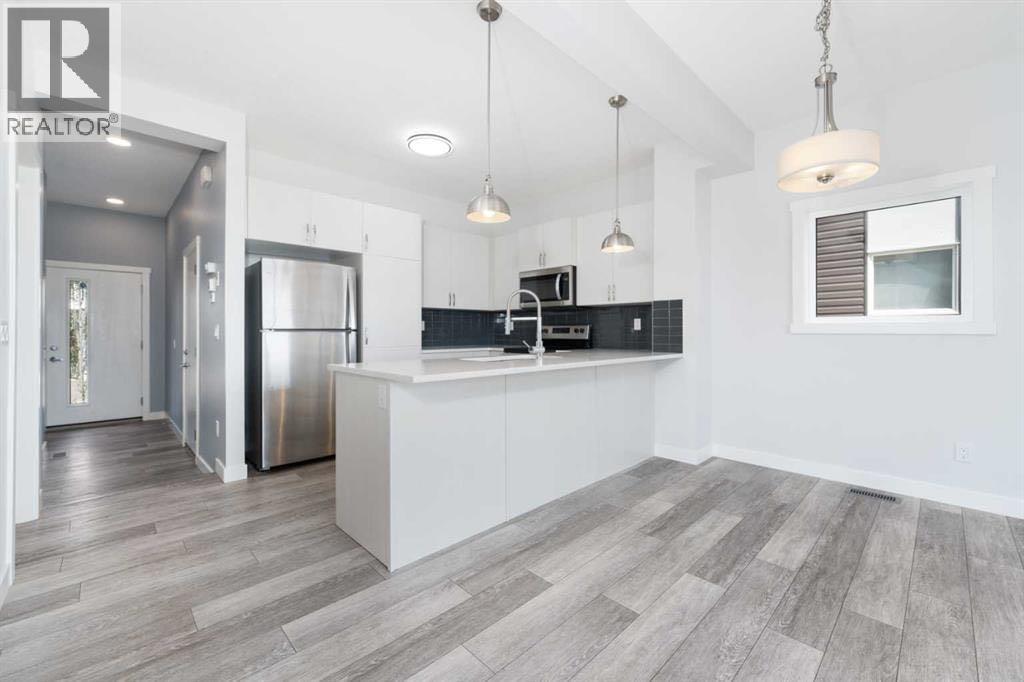 62 Walden Lane Se, Calgary, Alberta  T2X 2A7 - Photo 5 - A2283776