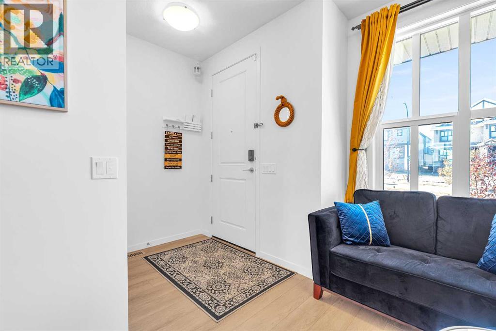 52 Edith Gate Nw, Calgary, Alberta  T3A 1Z2 - Photo 3 - A2265136