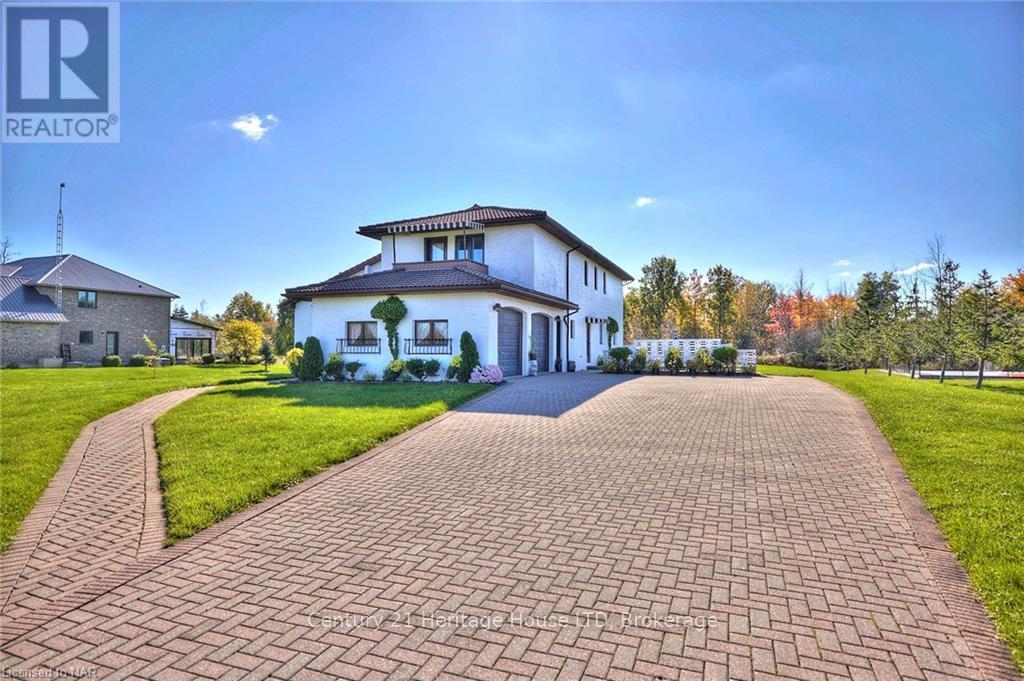 191 Cairns Crescent, Fort Erie, Ontario  L2A 5M4 - Photo 4 - X12457532