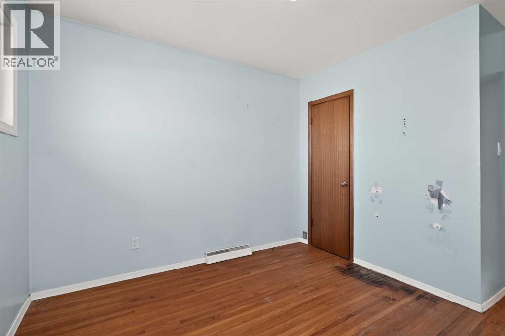 44 Winslow Crescent Sw, Calgary, Alberta  T3C 2R1 - Photo 16 - A2276396