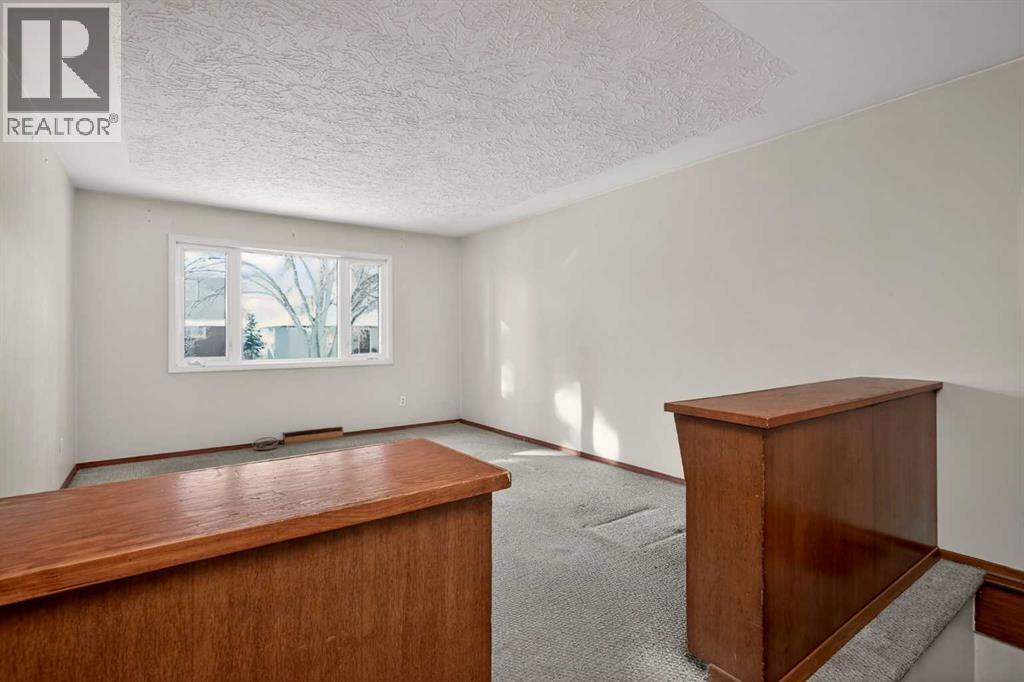 44 Winslow Crescent Sw, Calgary, Alberta  T3C 2R1 - Photo 9 - A2276396