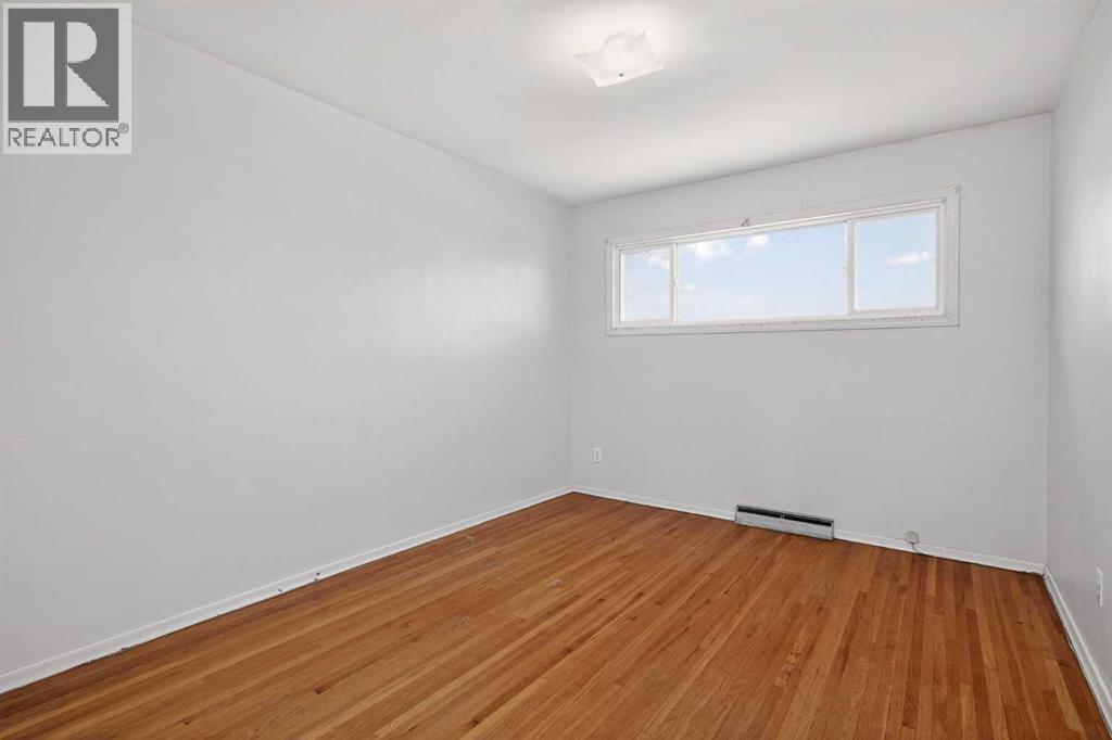 44 Winslow Crescent Sw, Calgary, Alberta  T3C 2R1 - Photo 17 - A2276396