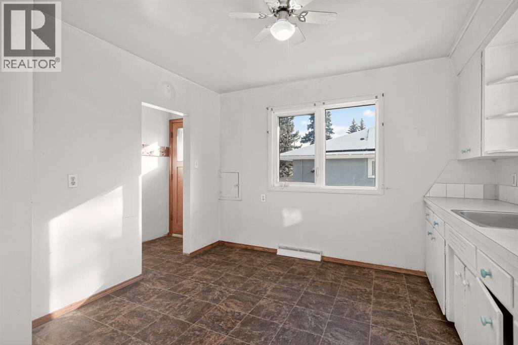 44 Winslow Crescent Sw, Calgary, Alberta  T3C 2R1 - Photo 12 - A2276396