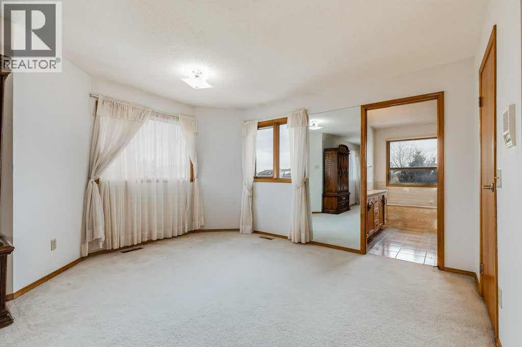 106 Sienna Hills Drive Sw, Calgary, Alberta  T3H 2C8 - Photo 31 - A2282460