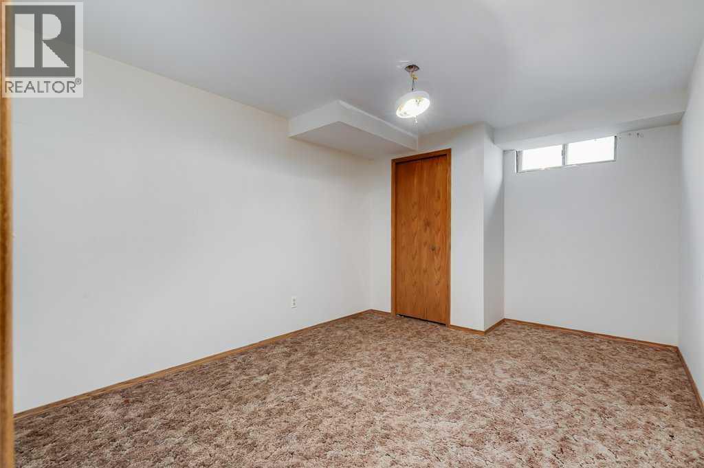 106 Sienna Hills Drive Sw, Calgary, Alberta  T3H 2C8 - Photo 39 - A2282460