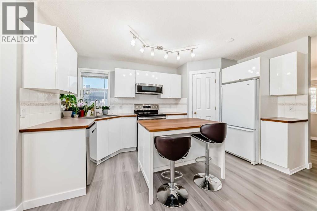 76 Tuscany Way Nw, Calgary, Alberta  T3L 2A4 - Photo 8 - A2284441