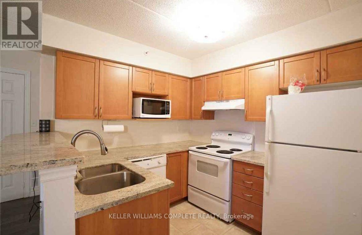 106 - 1340 Main Street E, Milton, Ontario  L9T 7S6 - Photo 2 - W12768404