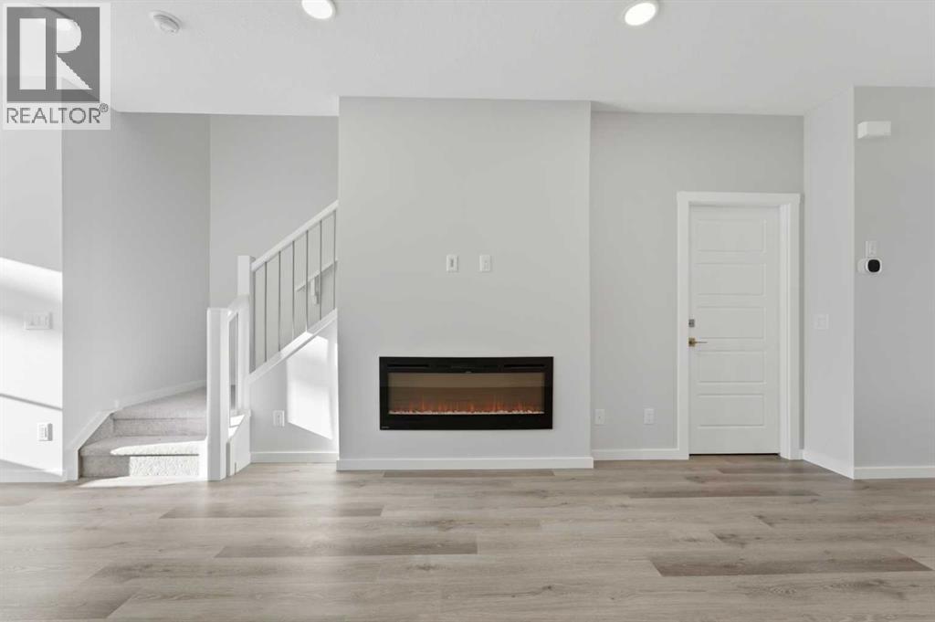 8 Heartwood Lane Se, Calgary, Alberta  T3S 0P9 - Photo 7 - A2281663