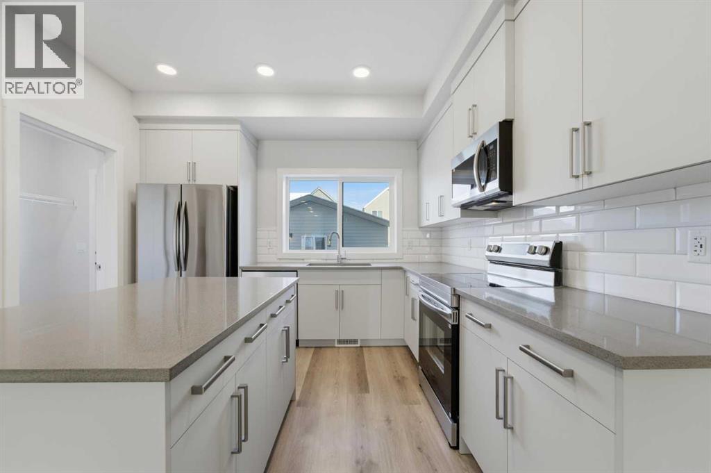 8 Heartwood Lane Se, Calgary, Alberta  T3S 0P9 - Photo 9 - A2281663