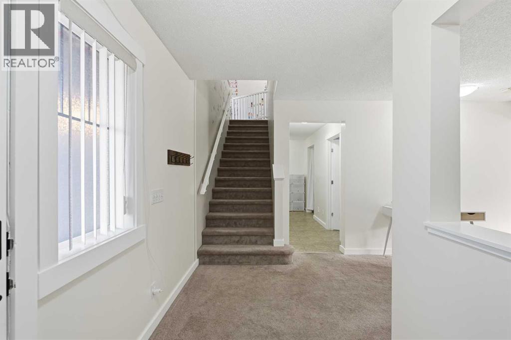 217 Coopers Grove Sw, Airdrie, Alberta  T2B 0G4 - Photo 21 - A2267001