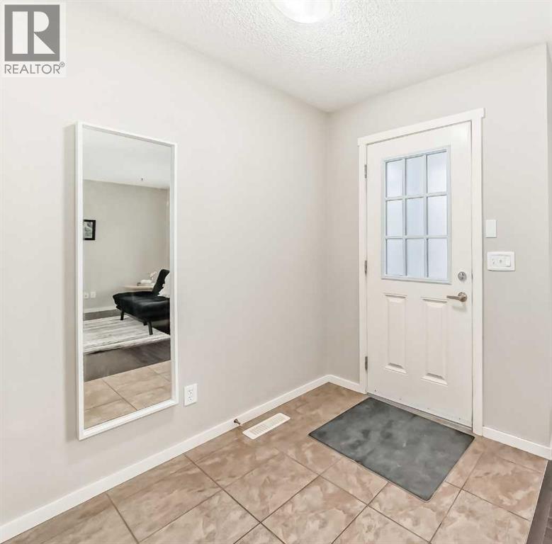 822 Panatella Boulevard Nw, Calgary, Alberta  T3K 0n7 - Photo 3 - A2284706