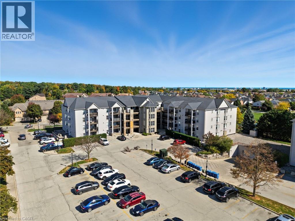 1421 Walkers Line Unit# 304, Burlington, Ontario  L7M 4P4 - Photo 2 - 40775506