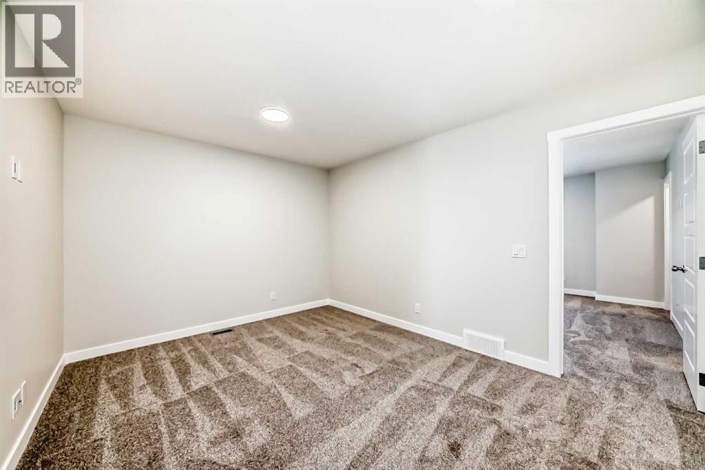 241 Bridgeport Gate, Chestermere, Alberta  T1X 1L6 - Photo 25 - A2284429