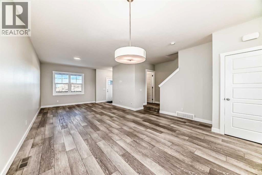 241 Bridgeport Gate, Chestermere, Alberta  T1X 1L6 - Photo 7 - A2284429