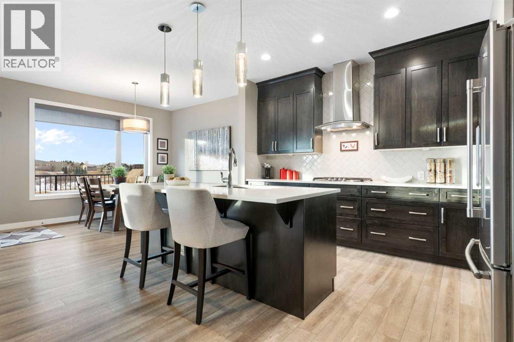 67 Fireside Terrace, Cochrane, Alberta  T4C 2S9 - Photo 4 - A2279448