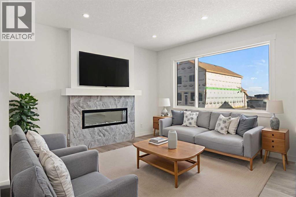 60 Creekstone Grove Sw, Calgary, Alberta  T2x 4X8 - Photo 7 - A2282171