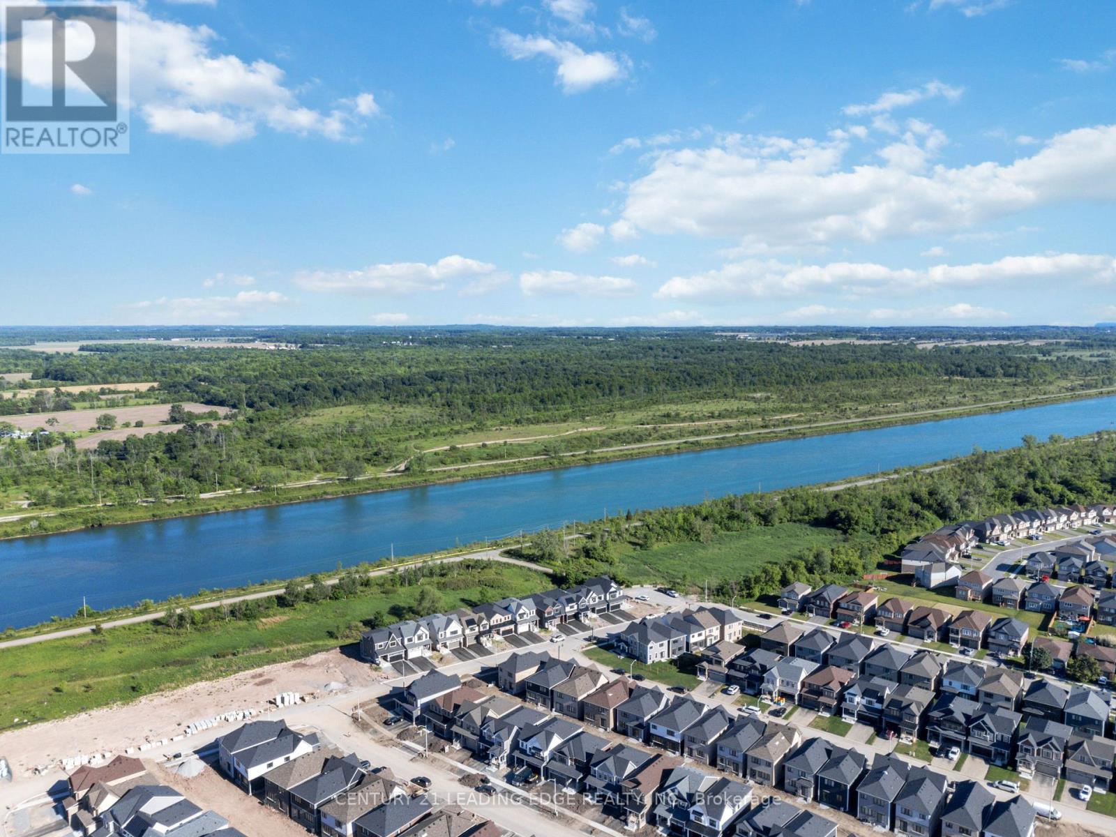 20 Aviron Crescent, Welland, Ontario  L3B 0M3 - Photo 4 - X12769126