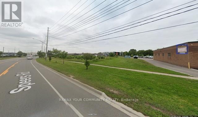 2150 Speers Road, Oakville, Ontario  L6L 2X8 - Photo 1 - W12769154