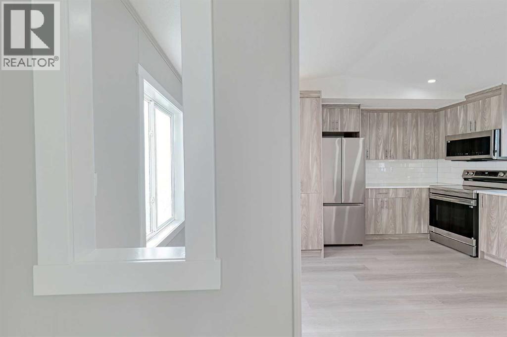 802, 1101 84 Street Ne, Calgary, Alberta  T2A 7X2 - Photo 10 - A2283320