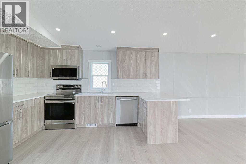 802, 1101 84 Street Ne, Calgary, Alberta  T2A 7X2 - Photo 8 - A2283320