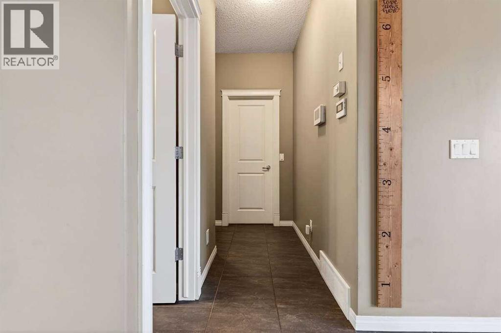 55 Sheep River Cove, Okotoks, Alberta  T1S 2T4 - Photo 4 - A2284784