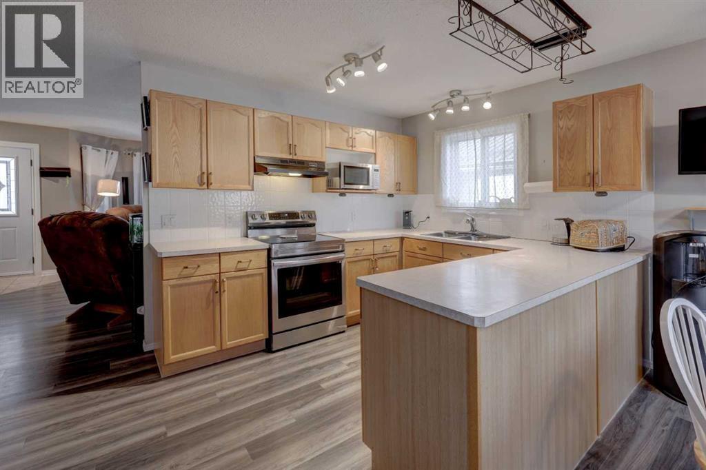 411 Strathford Boulevard, Strathmore, Alberta  T1P 1P2 - Photo 10 - A2283344