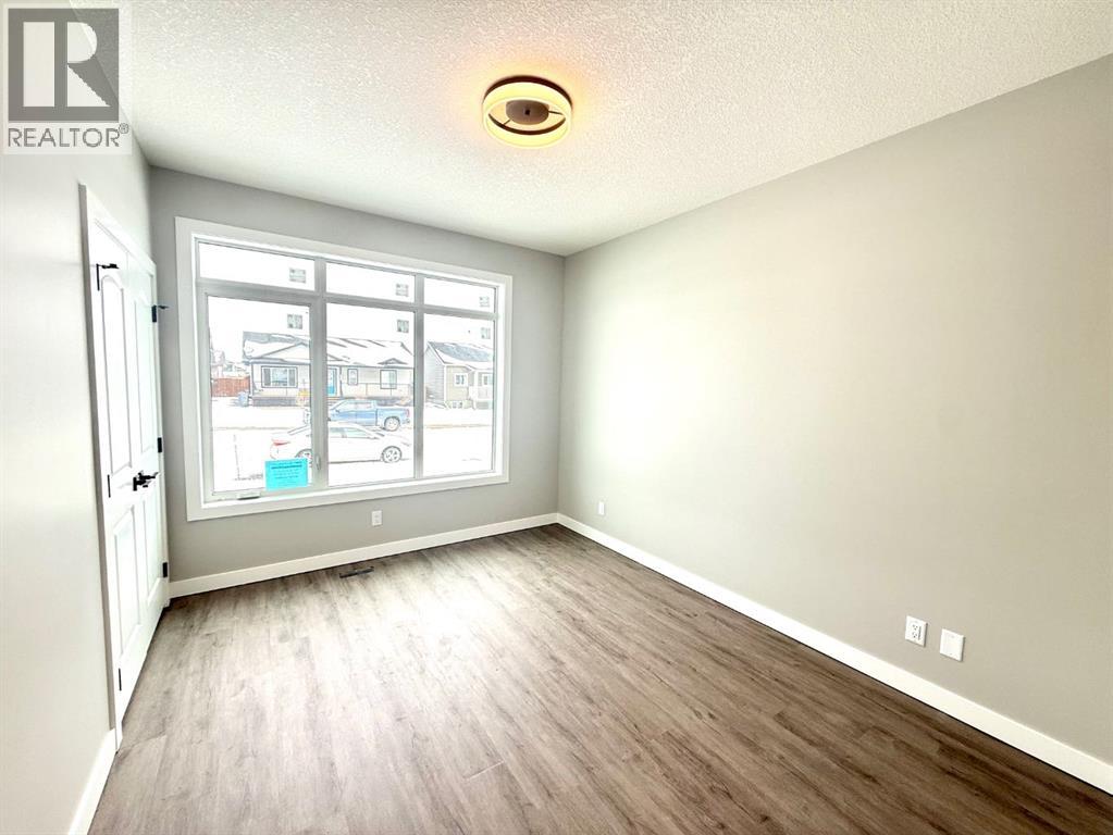 131 Westview Drive, Nanton, Alberta  T0L 1R0 - Photo 4 - A2273159