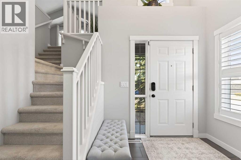 4 Cougarstone Square Sw, Calgary, Alberta  T3H 5J3 - Photo 3 - A2283347