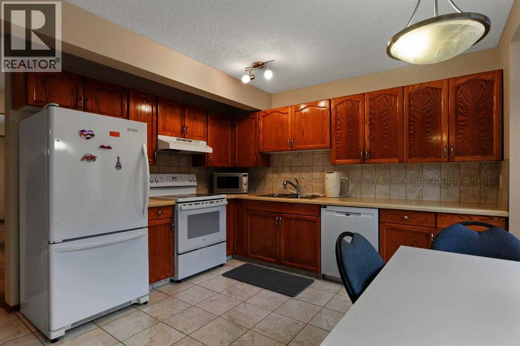 66 Patina Point Sw, Calgary, Alberta  T3H 3J7 - Photo 4 - A2283812