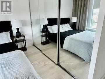 403 - 297 Oak Walk Drive, Oakville (Ro River Oaks), Ontario  L6H 3R6 - Photo 6 - W12769596