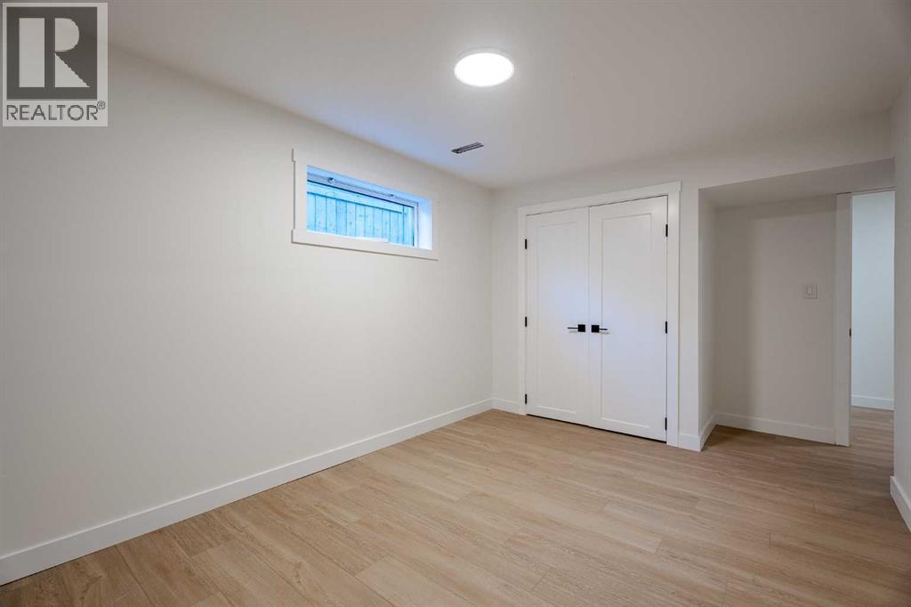 1024 Hunterston Place Nw, Calgary, Alberta  T2K 4N6 - Photo 41 - A2276613