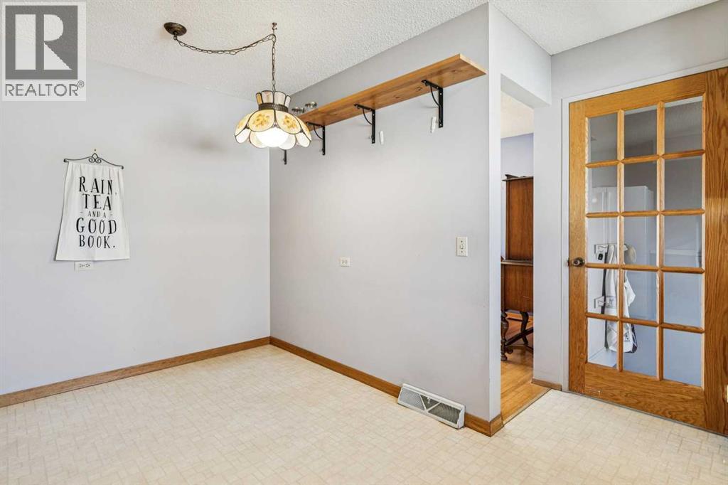 256 Huntridge Road Ne, Calgary, Alberta  T2K 4B6 - Photo 11 - A2284550