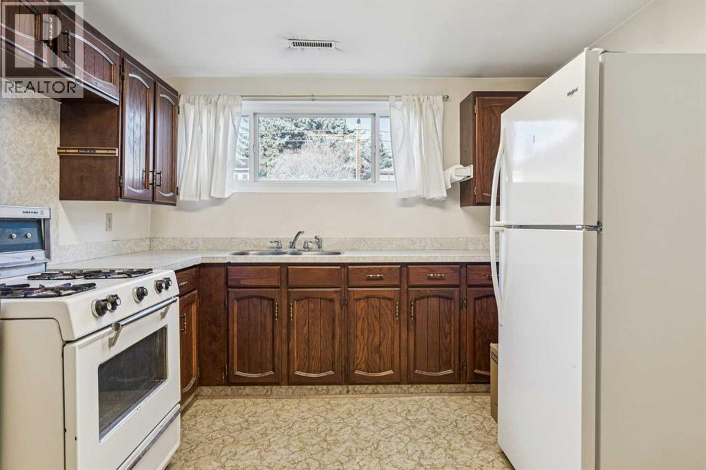 256 Huntridge Road Ne, Calgary, Alberta  T2K 4B6 - Photo 26 - A2284550