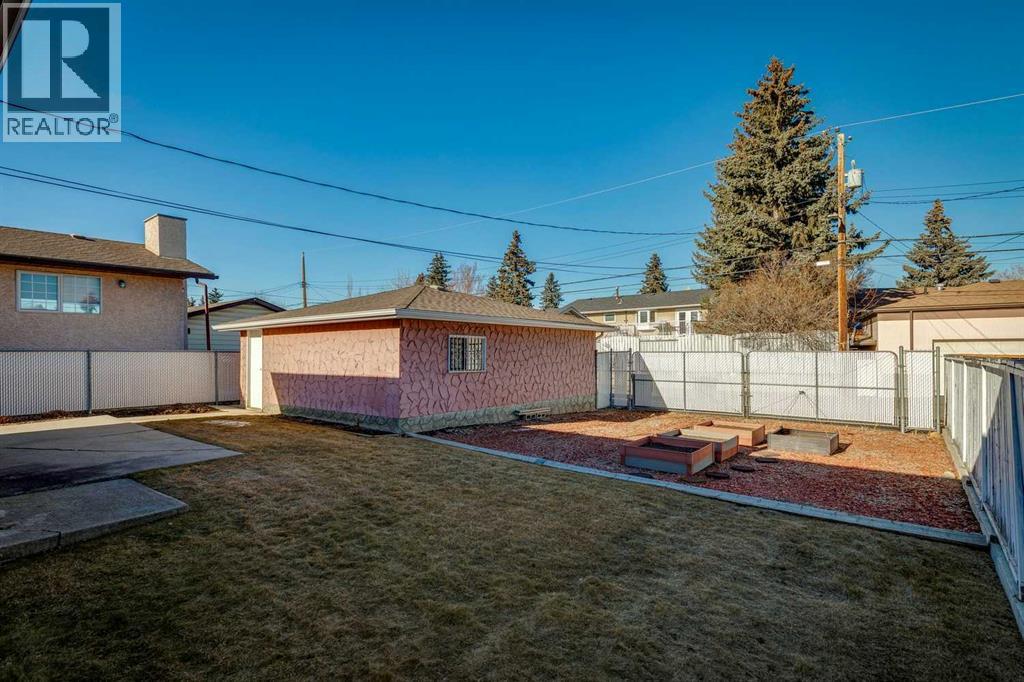 256 Huntridge Road Ne, Calgary, Alberta  T2K 4B6 - Photo 36 - A2284550