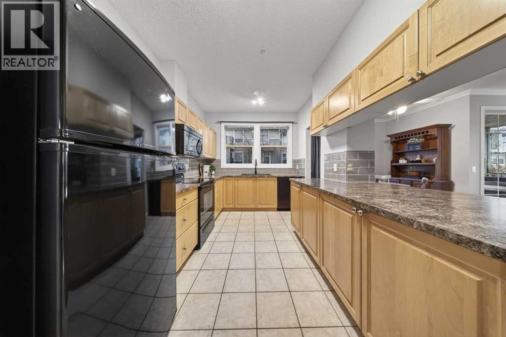 2127, 1010 Arbour Lake Road Nw, Calgary, Alberta  T3G 4Y8 - Photo 6 - A2283495