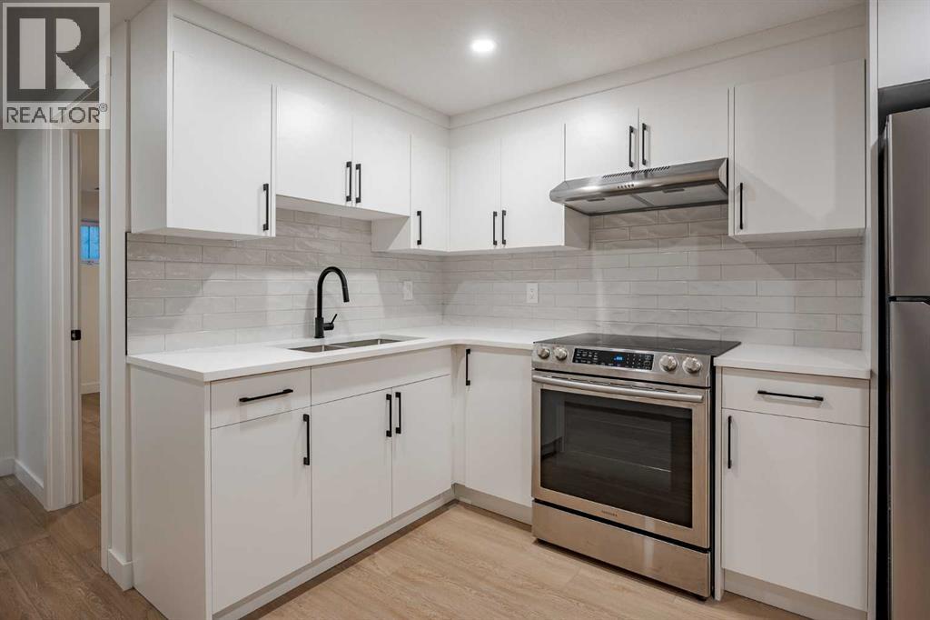 1024 Hunterston Place Nw, Calgary, Alberta  T2K 4N6 - Photo 38 - A2276613