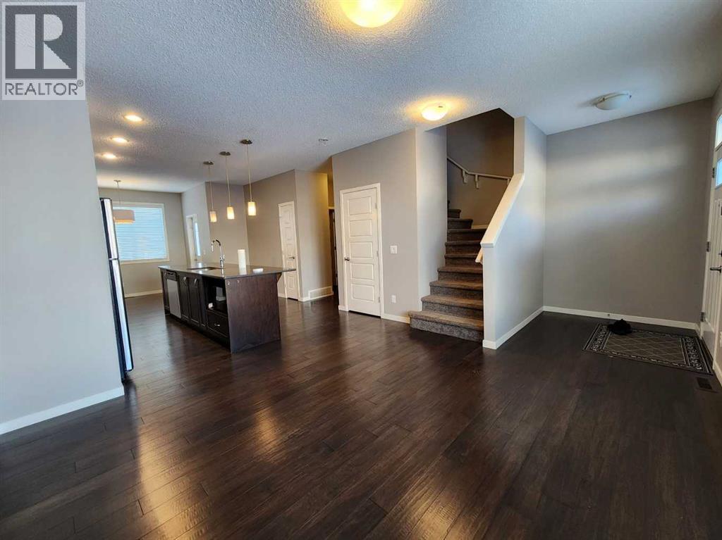 217 Panatella Walk Nw, Calgary, Alberta  T3K 0Z3 - Photo 6 - A2283128