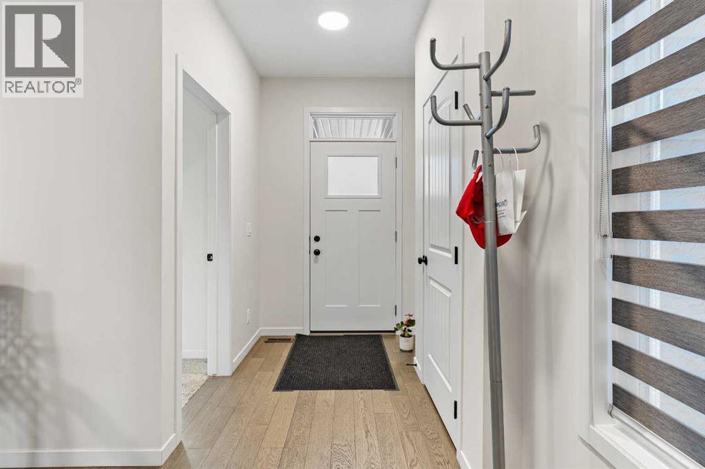 133 Chelsea Glen, Chestermere, Alberta  T1X 2P4 - Photo 4 - A2282078